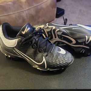 Nike Black and White Softball Cleats with Swoosh Accents